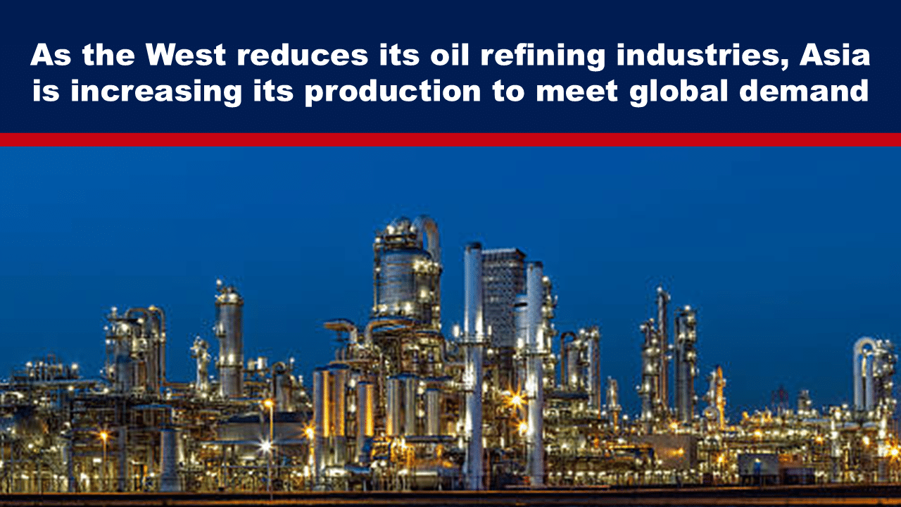 Expose News Oil refinery at night with bright lights against a blue sky, highlighting Asia's increase in production as Western industries reduce output.