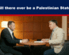 Expose News: Two men engaged in a lively discussion about the future of a Palestinian State, surrounded by bookshelves.
