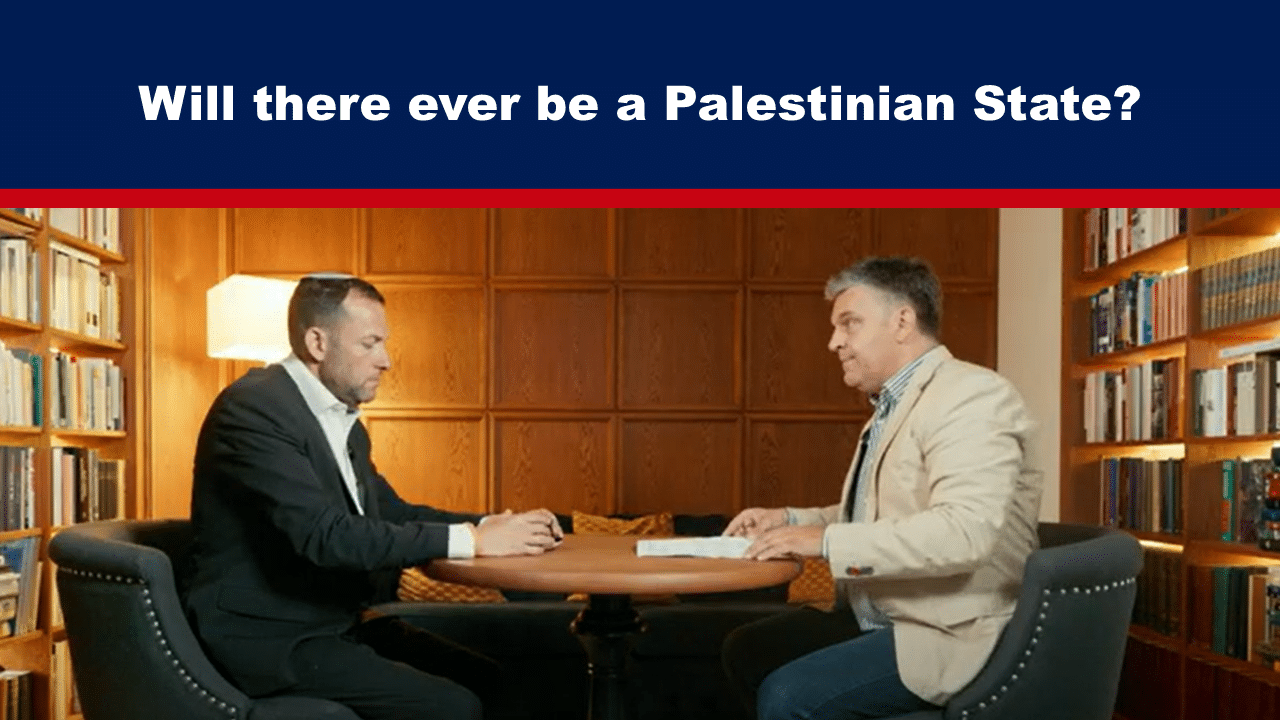 Expose News: Two men engaged in a lively discussion about the future of a Palestinian State, surrounded by bookshelves.