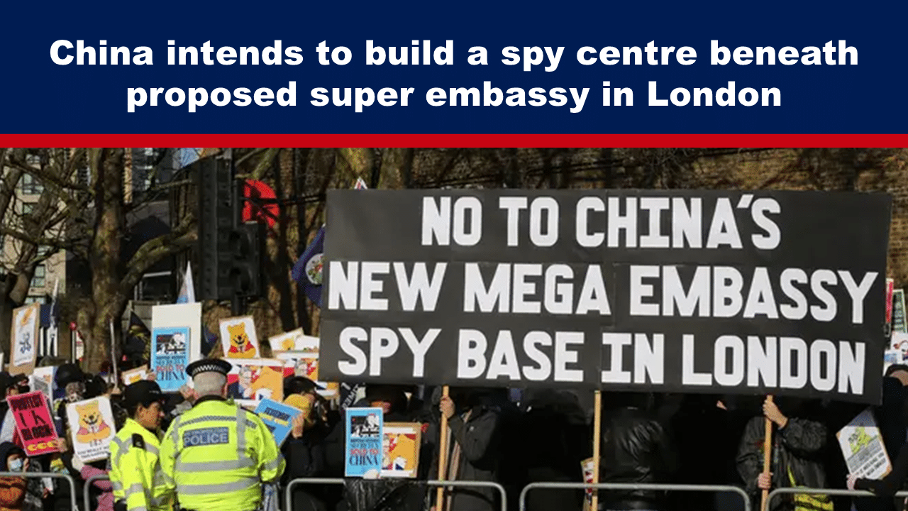 Expose News: Crowd protesting in London against China’s proposed super embassy and alleged spy centre plans, voicing concerns and holding signs.
