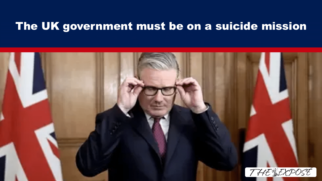 - The Expose Man in a suit adjusts his glasses in front of British flags, beneath a bold banner that reads: 'The UK government must be on a suicide mission'.