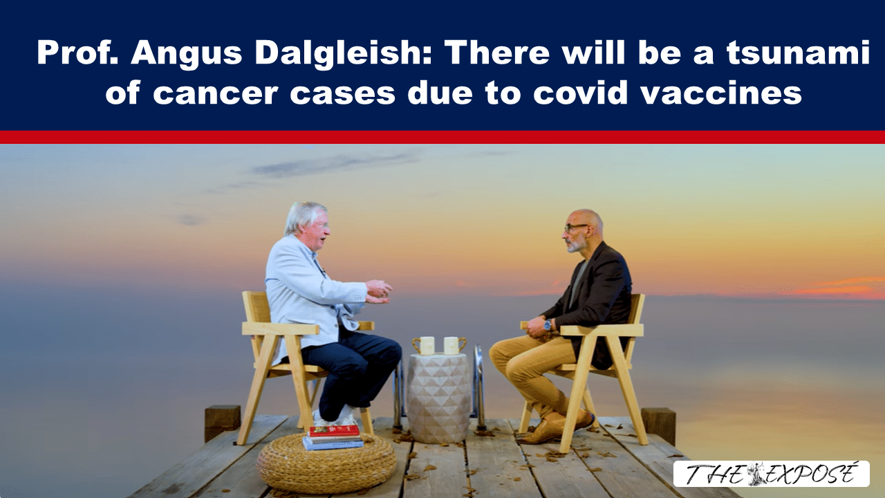 JunFeat23c - The Expose Headline reads 'Prof. Angus Dalgleish: There will be a tsunami of cancer cases due to covid vaccines' with two men seated on a dock at sunset, engaged in conversation.
