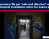 Medical staff in full PPE stand in an elevator corridor, guiding a patient into the elevator.