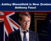 Top banner proclaims 'Dr. Ashley Bloomfield is New Zealand’s Anthony Fauci' as a man in a suit speaks at a podium with microphones and a New Zealand flag behind him